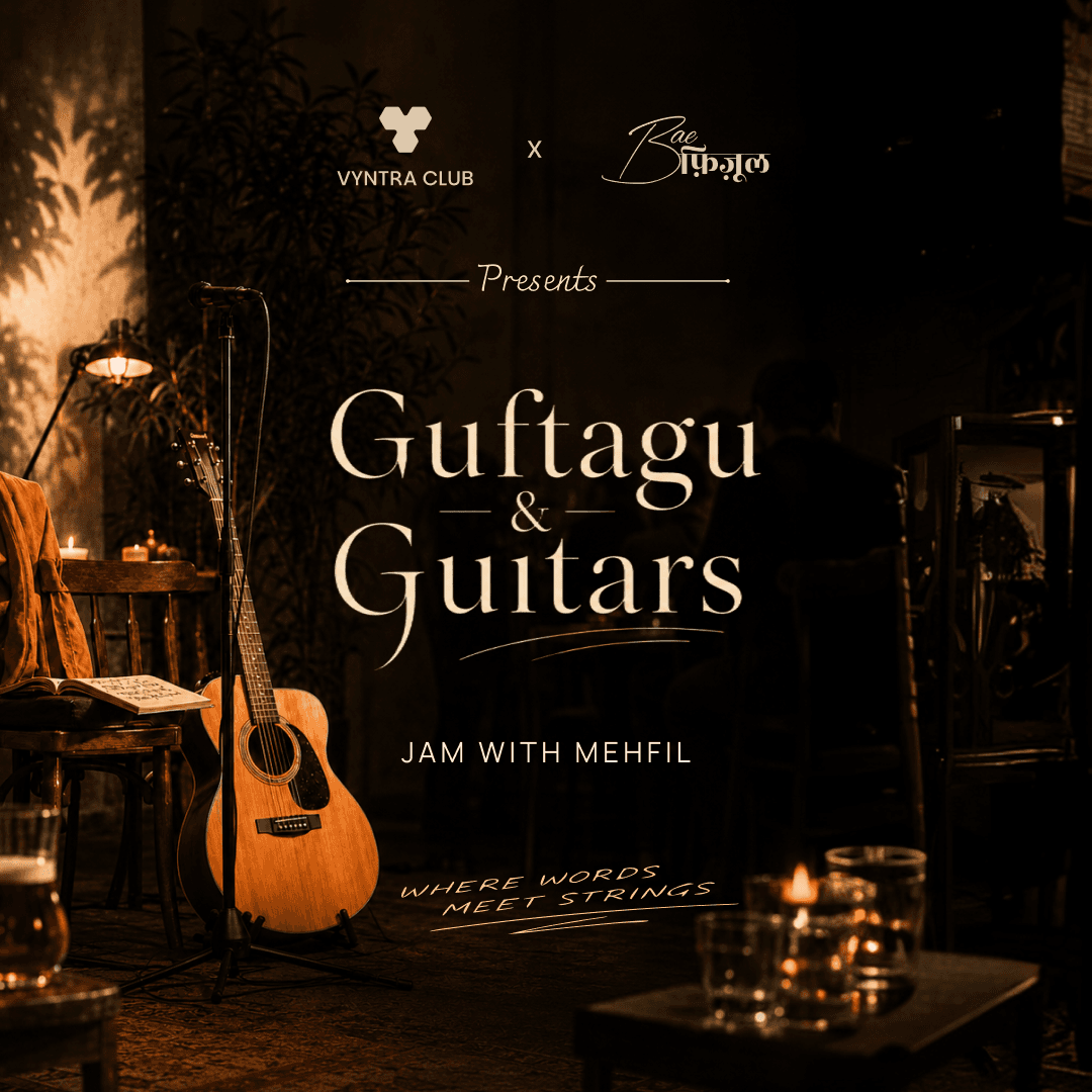 A candlelit acoustic guitar and mic stand set up for Guftagu & Guitars, Vyntra Club's Jamming Night